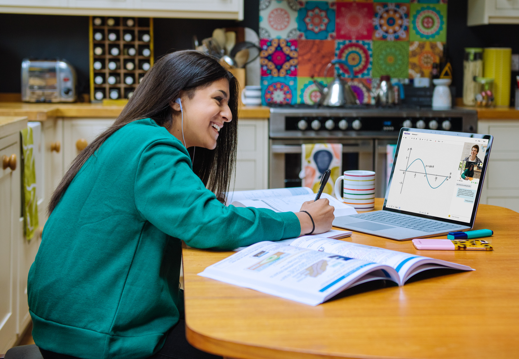 student-with-laptop-smiling