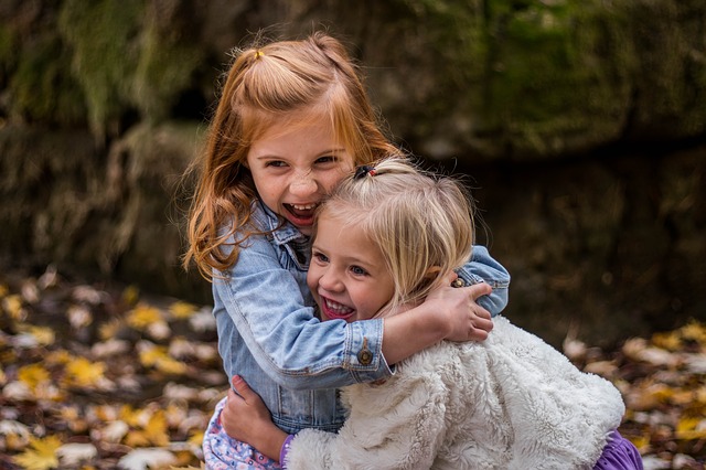 sisters hugging on sisters day