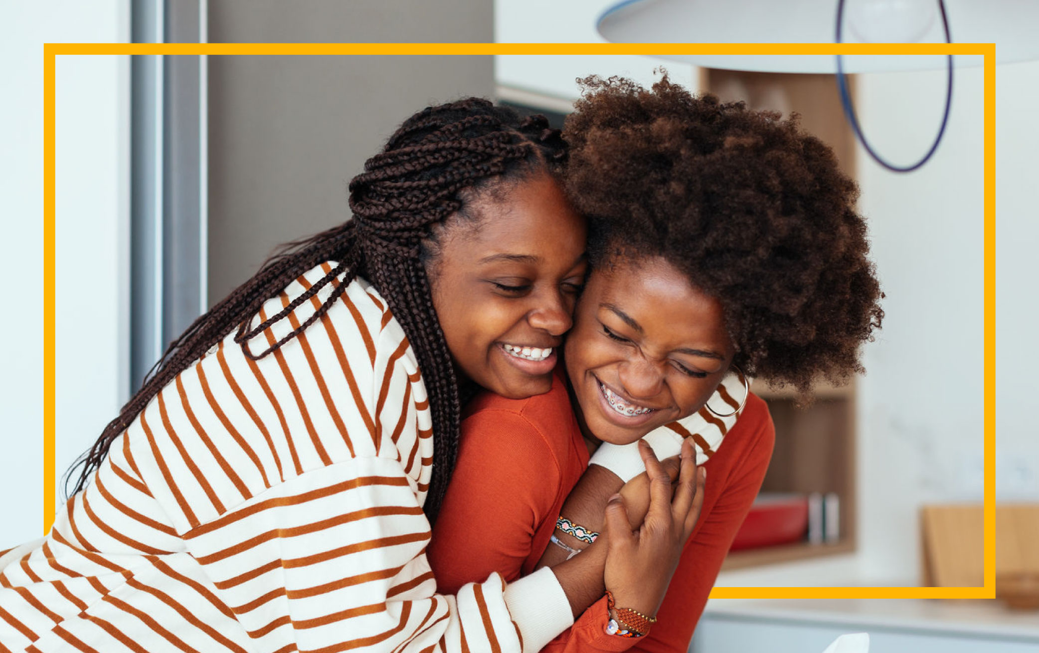 two-sisters-hugging-smiling