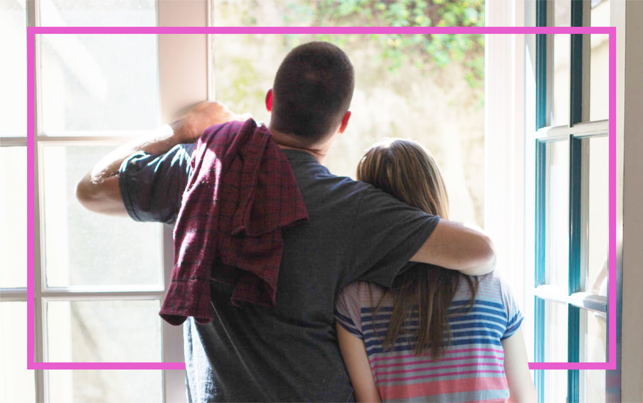 father-with-arm-around-teenage-daughter-by-window